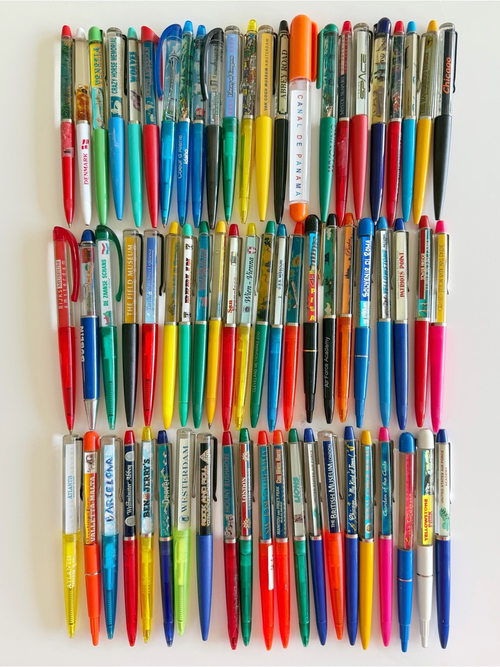 Collection of 66 souvenir vintage floating pens floaty pens